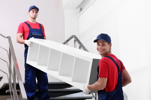 Professional removal team working in a Belgravia townhouse area