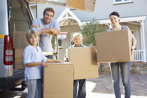 Careful loading of furniture into a local moving truck in Belgravia
