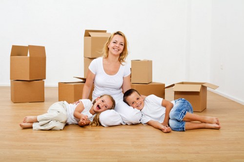 Professional movers managing access and stairway challenges in a Belgravia property