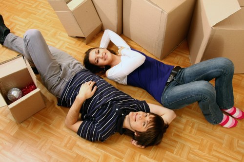 Staff using PPE during a careful moving job